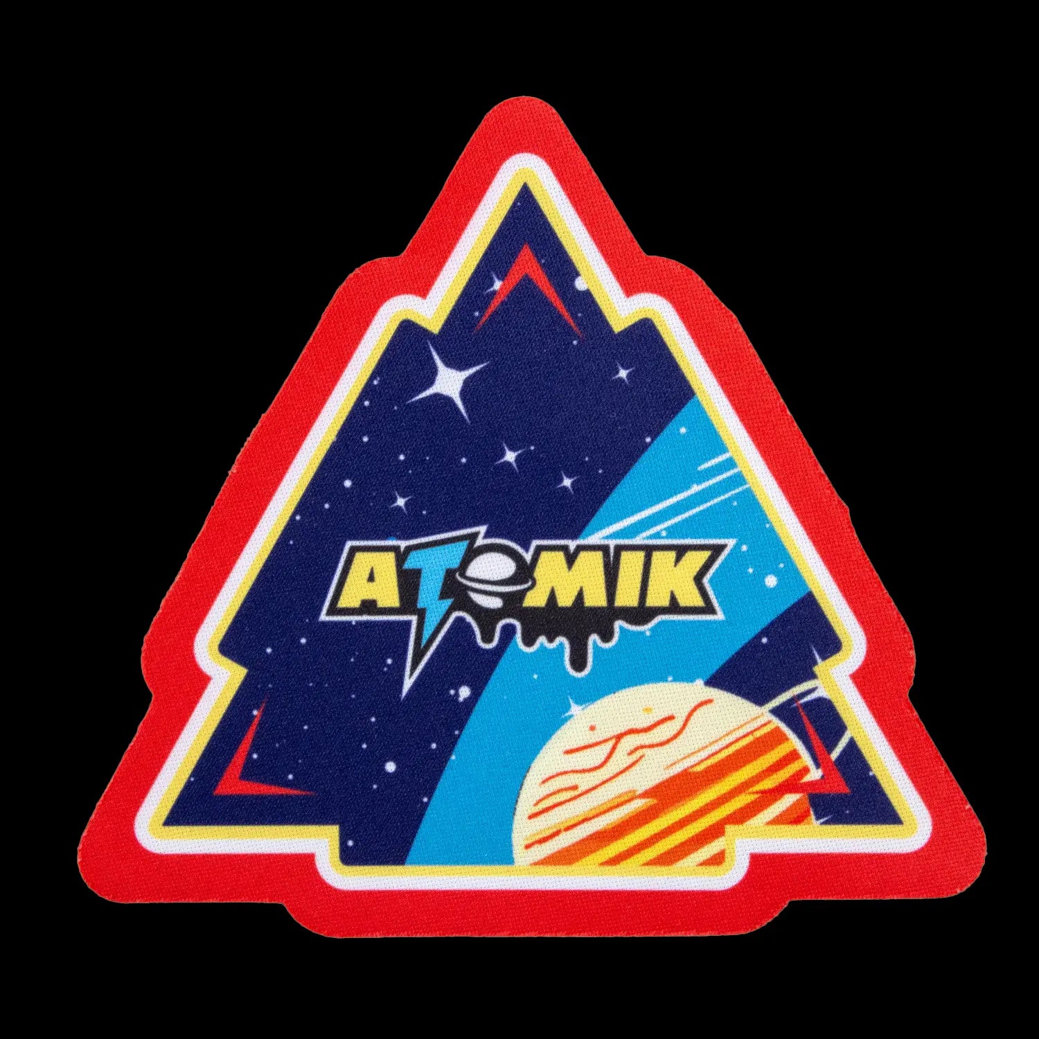 A triangular sticker featuring the “Atomik” brand logo with a space-themed design including a planet and stars.