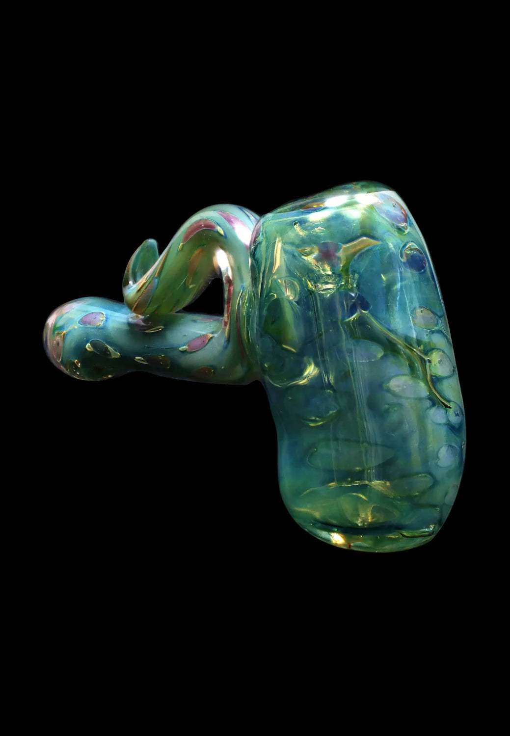 Angled close-up of the iridescent Smoke Cartel Gold Fume Bubble Trap Hammer Bubbler - 6 in., showing swirled green-blue glass with raised bubbles against a black background