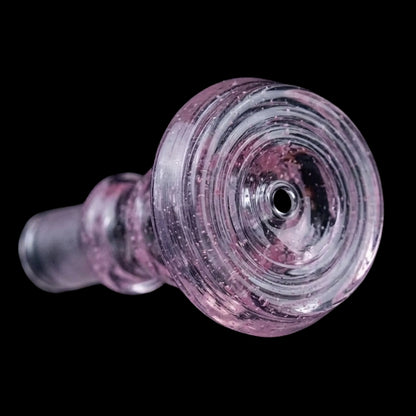 Close-up front-angle view of the pink, speckled Empire Glassworks PuffCo Peak Pro 3D XL Chamber Glass Joystick Cap - Pink Slyme against a black background