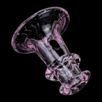 Close-up angled view of the Empire Glassworks PuffCo 'New Peak' & Proxy Glass Joystick Cap - Pink Slyme showing swirling pink glass details and a black circular opening.