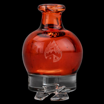 Close-up front view of the Empire Glassworks Puffco Pivot Glass Mouthpiece - Transparent Red showing its rounded translucent red bulb, etched logo, and clear glass base against a black background