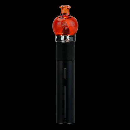 Center-framed close-up of the transparent red Empire Glassworks Puffco Pivot Glass Mouthpiece atop a black device against a solid black background.