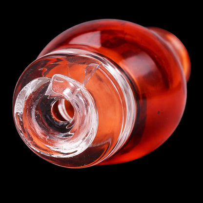 Close-up angled view of the transparent red Empire Glassworks Puffco Pivot Glass Mouthpiece showing the glossy rim and inner clear glass chamber against a black background