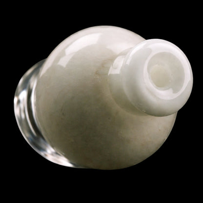 Close-up angled view of the Empire Glassworks Puffco Pivot Glass Mouthpiece - Glow in the Dark showing its rounded white mouthpiece and glossy dome against a black background
