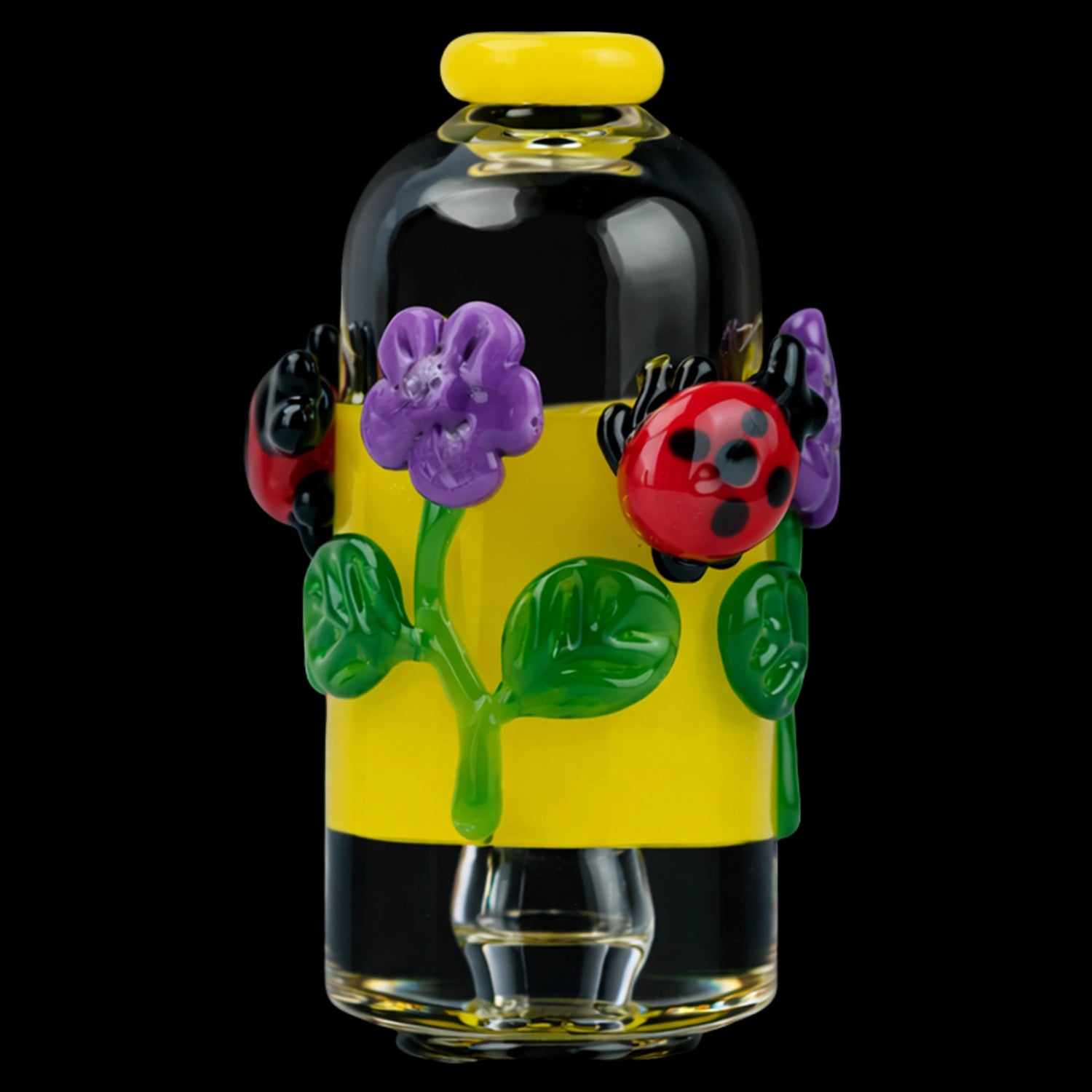 Close-up front view of the Empire Glassworks Puffco Pivot Glass Mouthpiece - Sunshine Garden showing a yellow band with purple flowers and a red ladybug.