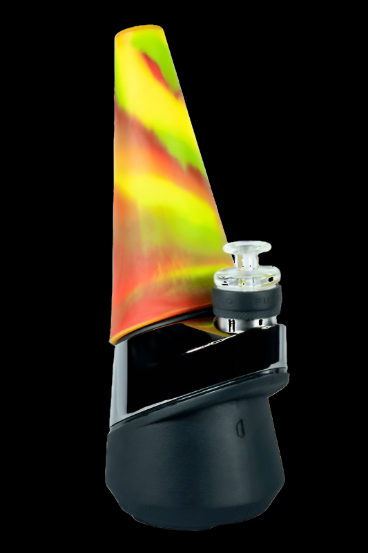 A colorful silicone carb cap atop a black electronic dab rig.