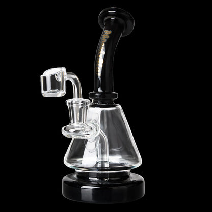 Close-up of the Green Flower Phoenix Star 7 Inches Dab Rig With 14Mm Quartz Banger showing its angled black neck and clear glass cone body against a black background