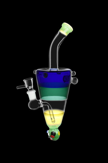 A colorful glass water pipe (rig) with a swirling, layered design in shades of blue, green, and yellow, isolated on a black background.