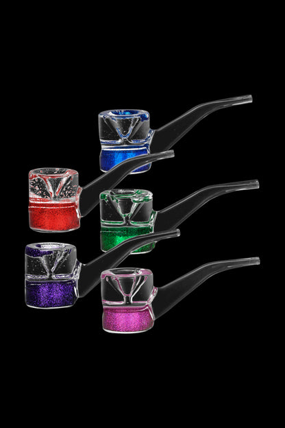 Assortment of colorful, glitter-filled glass bubblers against a black background.