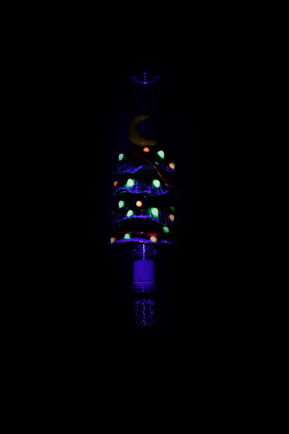 Glowing glass bong with colorful bubbles against a dark background.