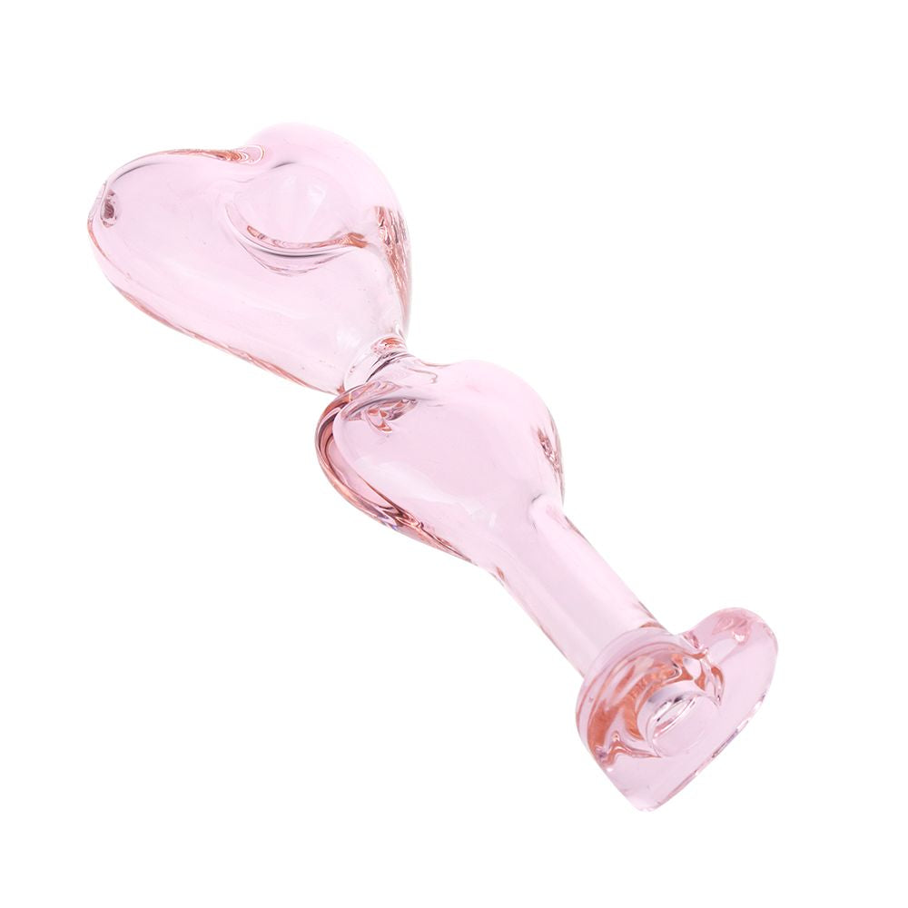 Angled top-down view of the pink 5.5" Pulsar Double Love Glass Hand Pipe showing two heart-shaped bulbs connected by a short stem on a white background