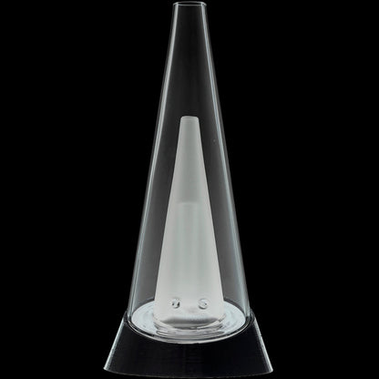 Close-up vertical shot of the Glassic Puffco Peak Replacement Glass cone against a black background, showing its clear tapered walls and frosted inner joint.