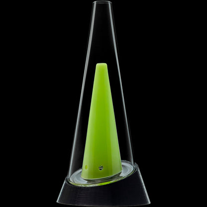 Close-up vertical view of the Glassic Puffco Peak Replacement Glass showing its clear tapered chamber with a bright green cone inside against a black background