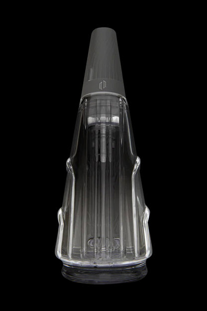 Clear glass cannabis oil rig with black accents, isolated on a black background.