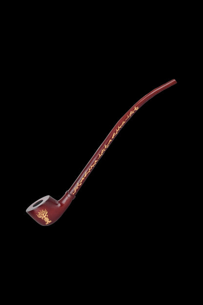 Red glass cannabis smoking pipe with gold detailing on a black background.