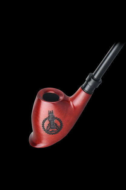 Red glass pipe with a laurel wreath and cannabis leaf design.