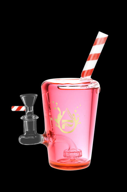 Pink glass bubbler water pipe resembling a milkshake with a striped straw and detachable bowl.