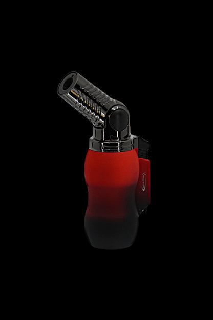 Red butane torch lighter for dabbing cannabis concentrates.
