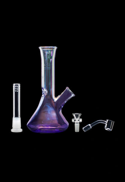 A studio shot of the 7-inch Queen of Bud Amethyst Dab Rig with its quartz nail, displayed against a dark backdrop.