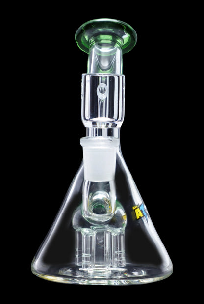 Clear glass water pipe (bong) with a complex percolator chamber, isolated on a black background.