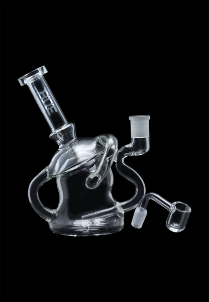 Angled side view of the Hue - Mushroom Dab Rig Clear - 6.8" on a black background, showing its clear glass body, curved intake tube, and tilted mouthpiece.