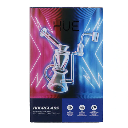 Angled close-up of the clear Hue - Hourglass Dab Rig Clear - 7.5" against a neon pink and blue lightning-striped backdrop.