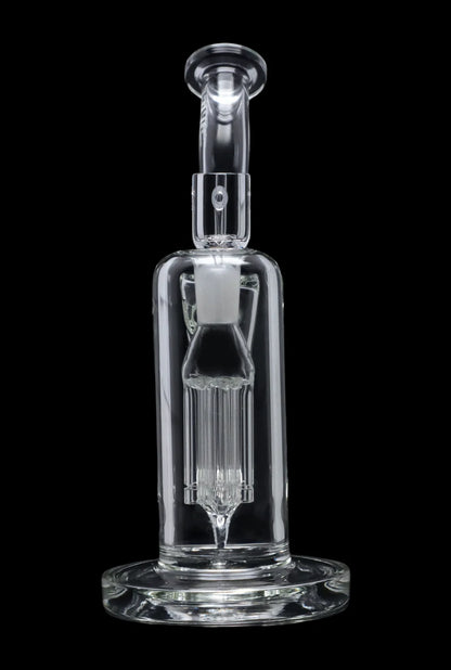 Clear glass dab rig with intricate percolator design, isolated on a black background.