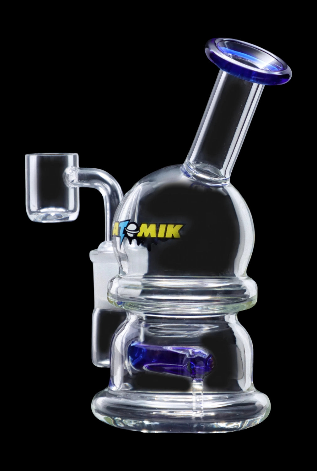 Clear glass dab rig with blue accents and a quartz nail.