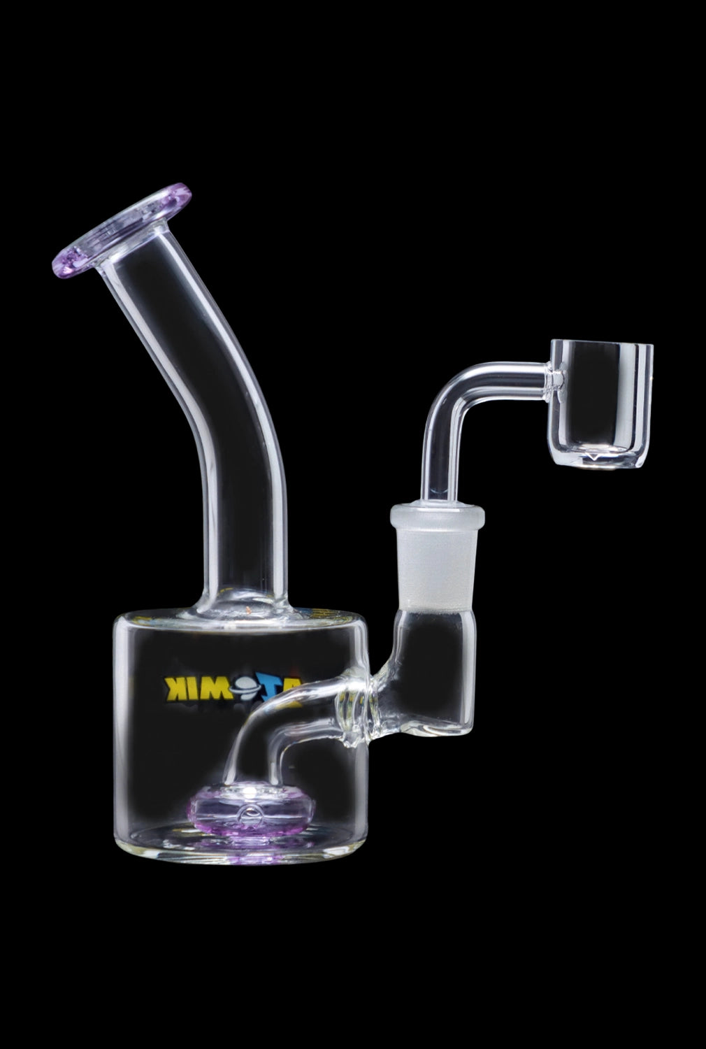 The Atomik Little Dipper Dab Rig is shown in a side view, highlighting its clear glass construction and compact size.