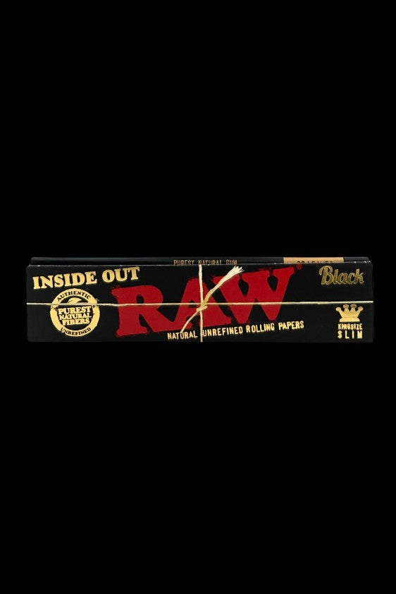 Packaging for RAW natural unrefined rolling papers, featuring branding and text on a black background.