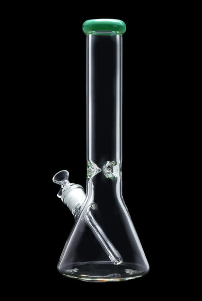 Clear glass bong with green accents and cannabis leaf detailing, isolated on a black background.