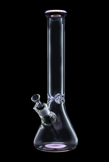 Tall glass bong with purple accents, isolated on a black background.