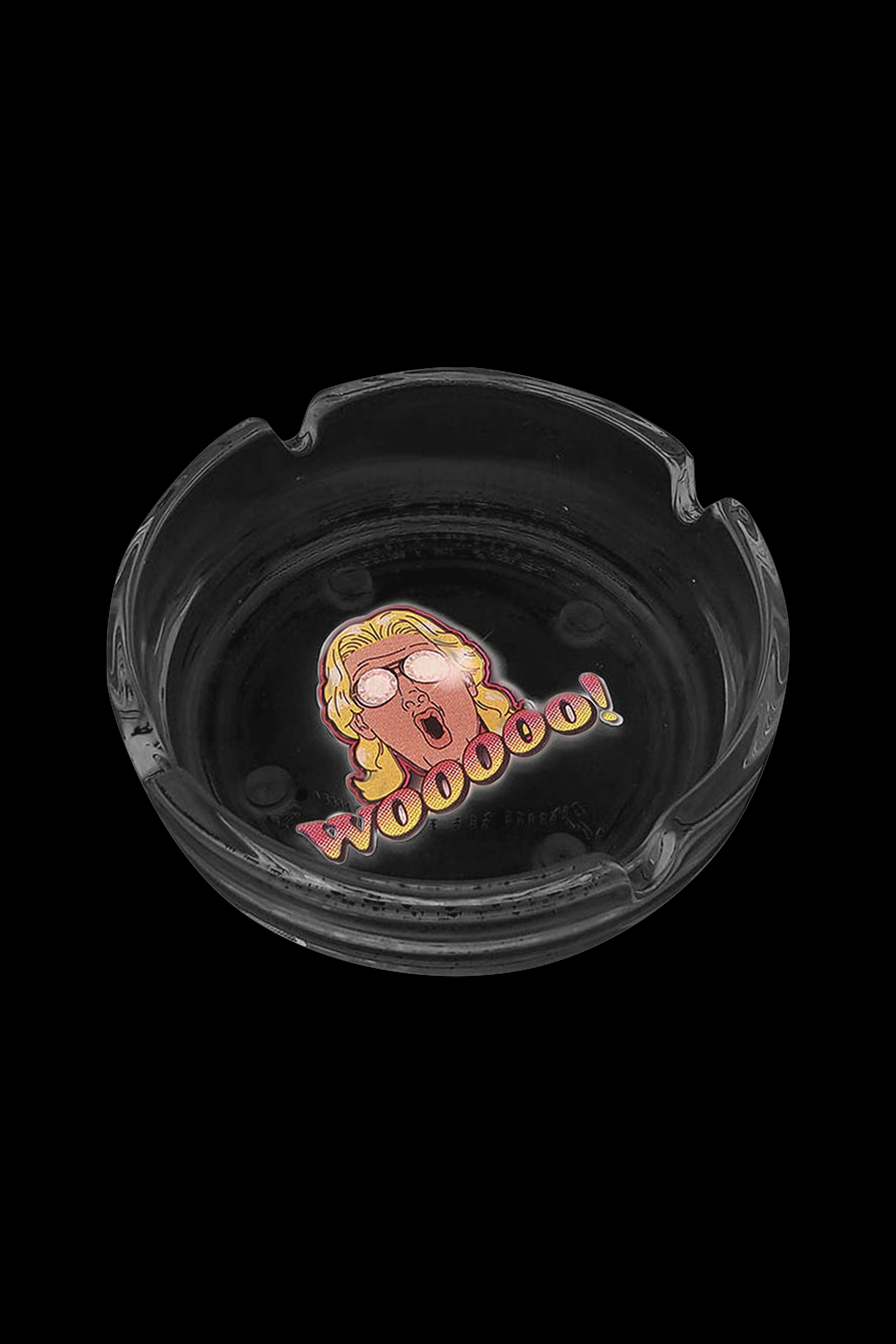 Clear glass ashtray with cartoonish graphic of a face and “Woohoo!” text.
