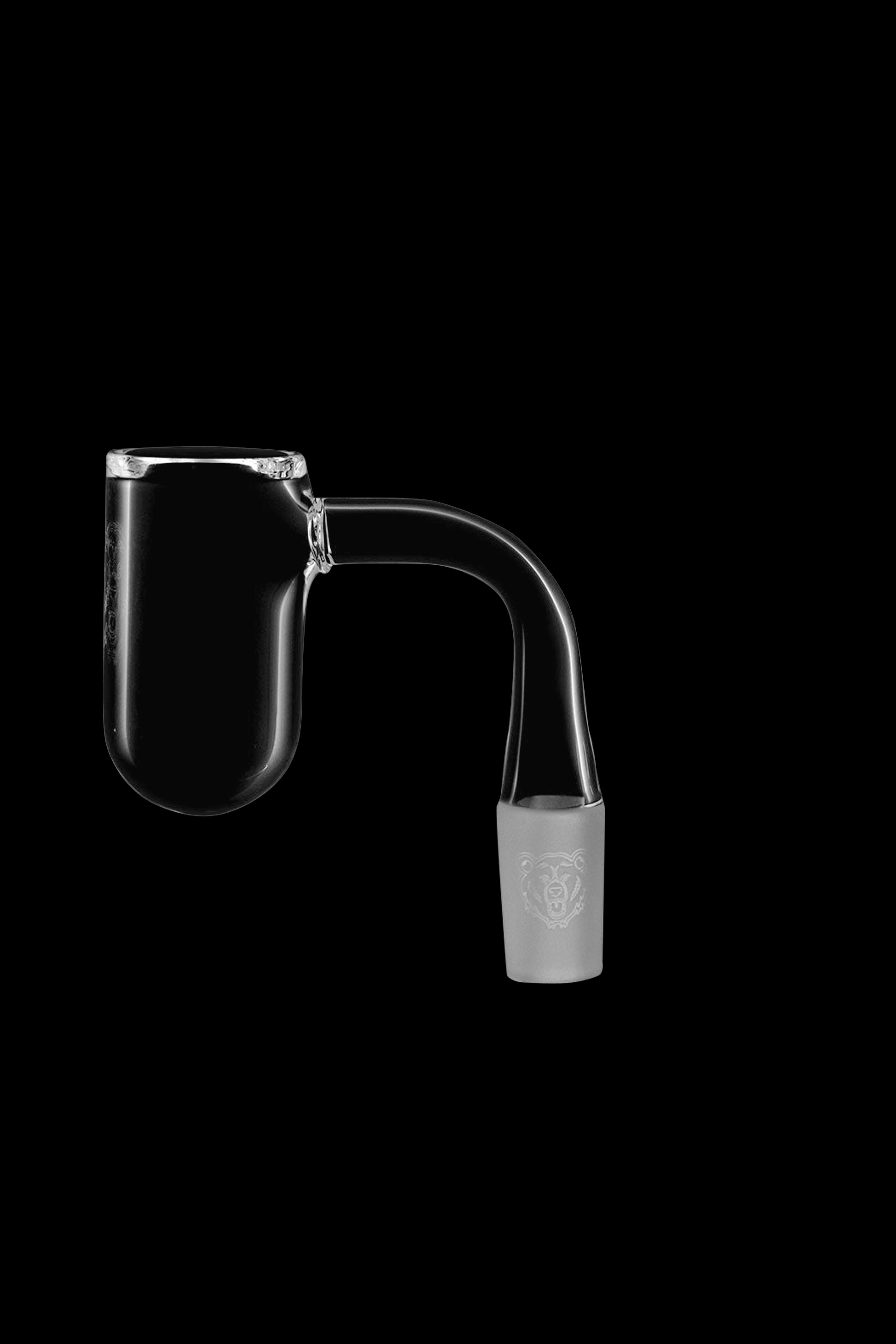 Clear glass dab rig with intricate etching on the downstem joint, isolated on a black background.