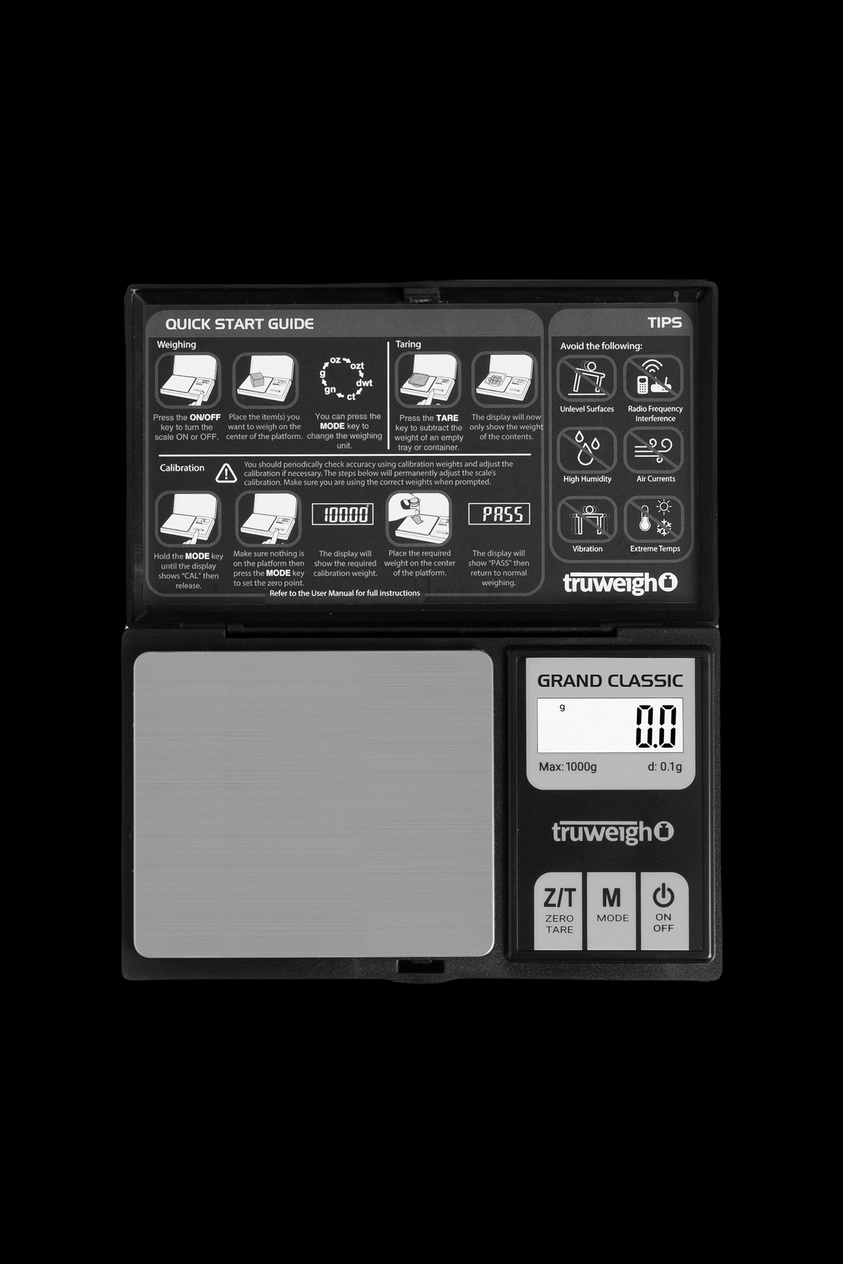 Close-up of a digital scale with a quick start guide for weighing, calibrating, and taring, labeled "TrueWeigh Grand Classic."