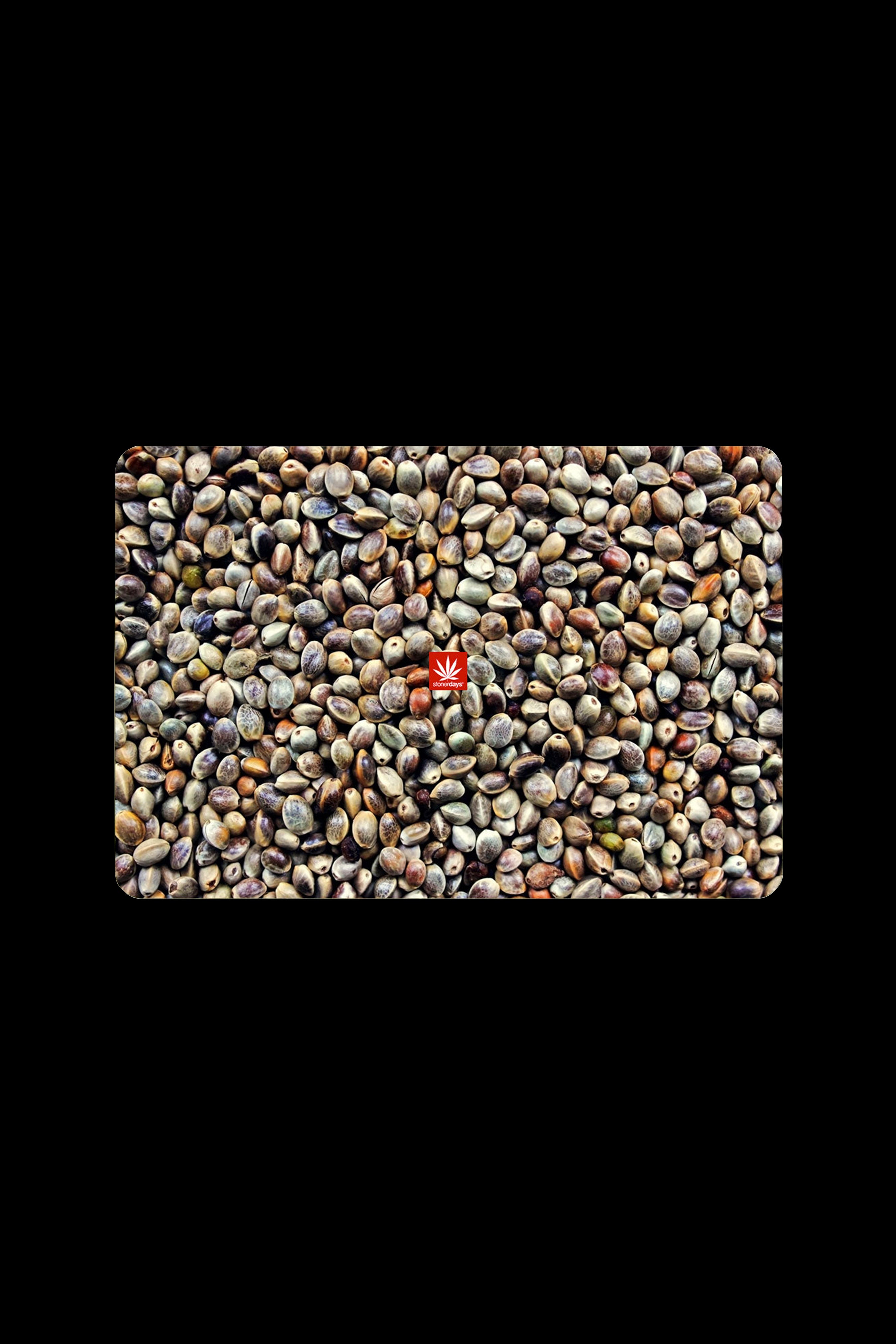 Close-up of cannabis seeds with a red and white leaf logo centered on the image.