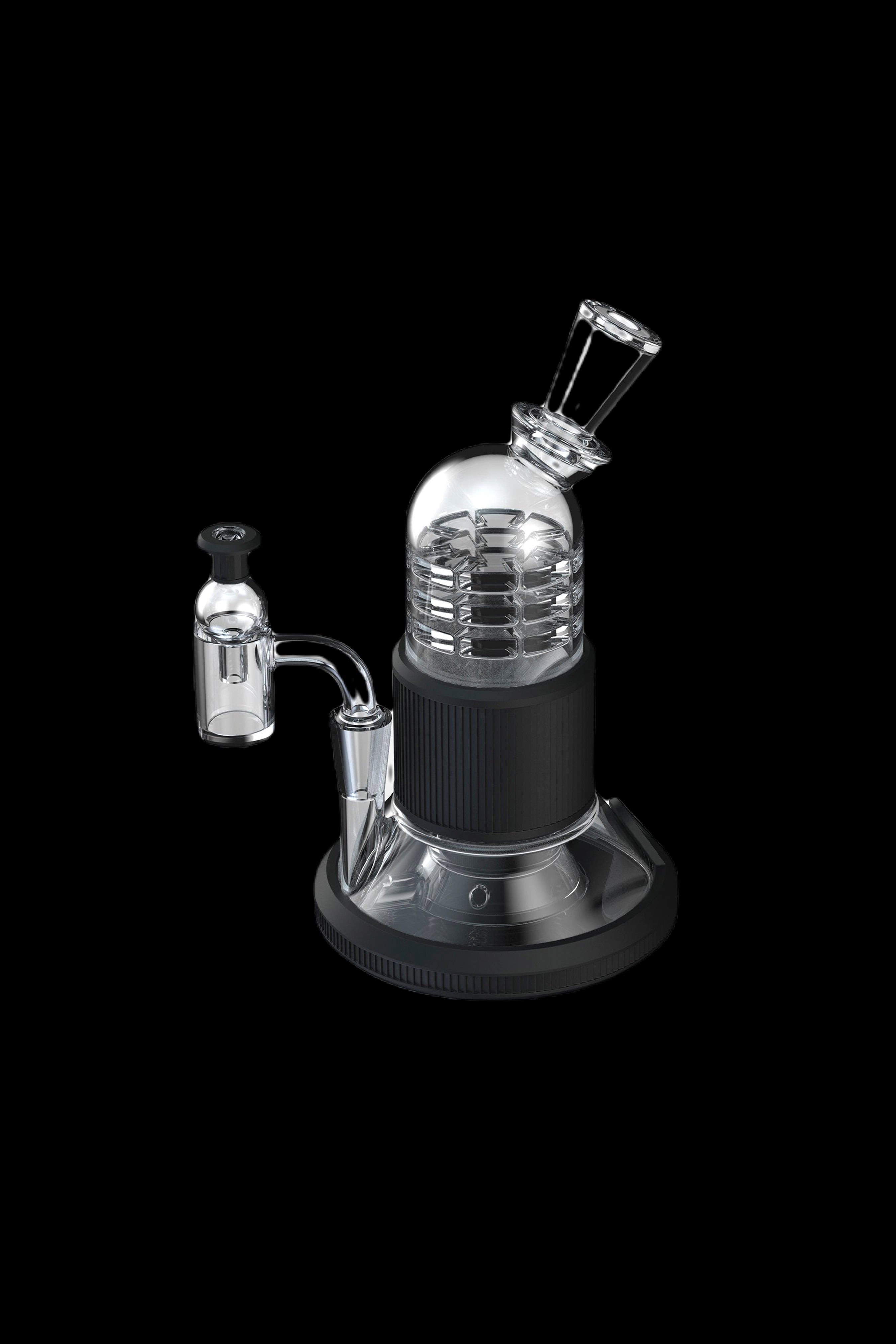 Black and clear glass dab rig with quartz banger and carb cap, isolated on a black background.