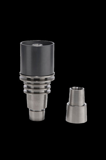 Two metal dab nails for vaporizing cannabis concentrates, isolated on a black background.
