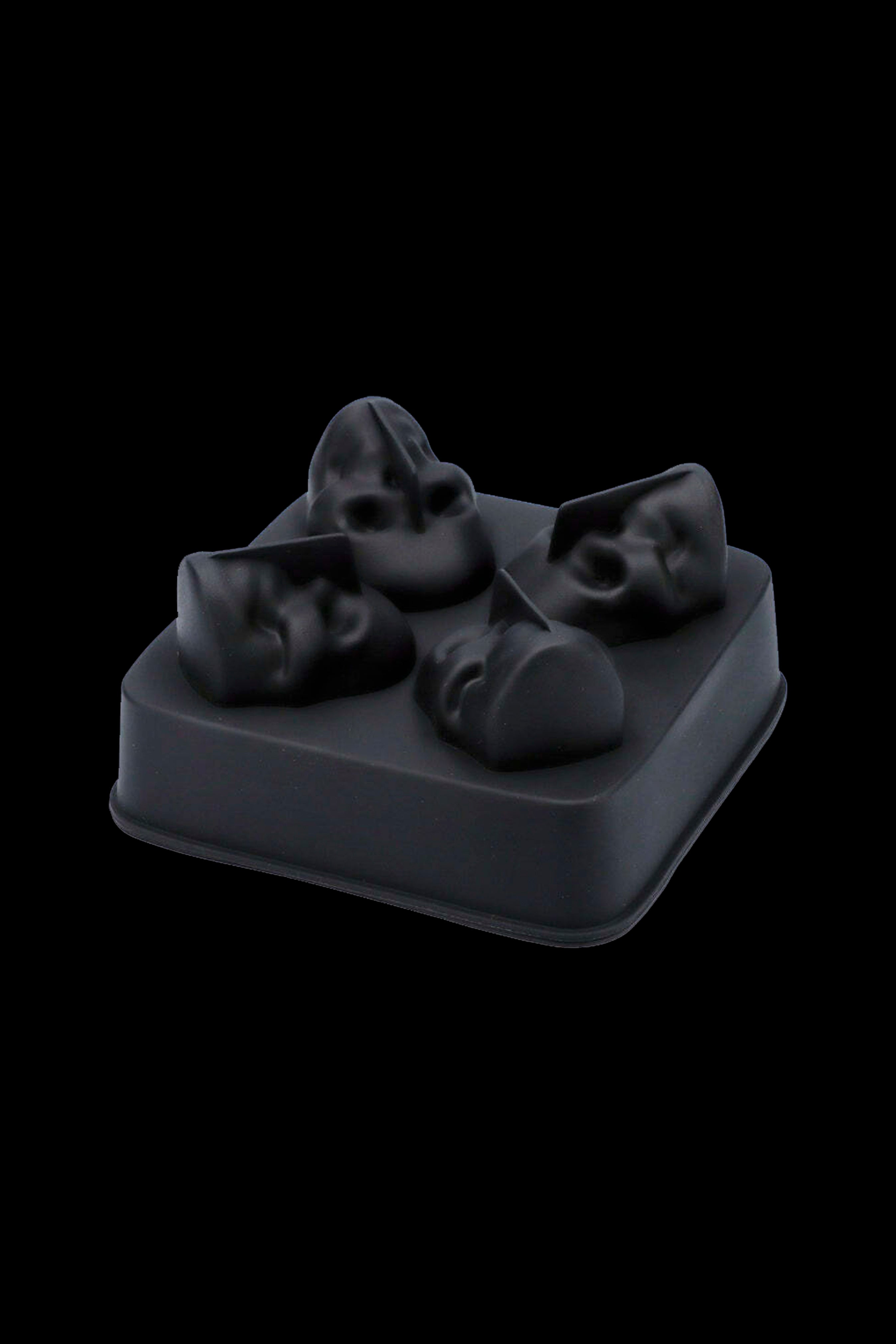 Black silicone mold with four skull-shaped cavities, likely for making cannabis edibles.