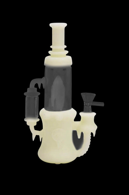 Yellow and black glass water pipe (bong) with dripping design.