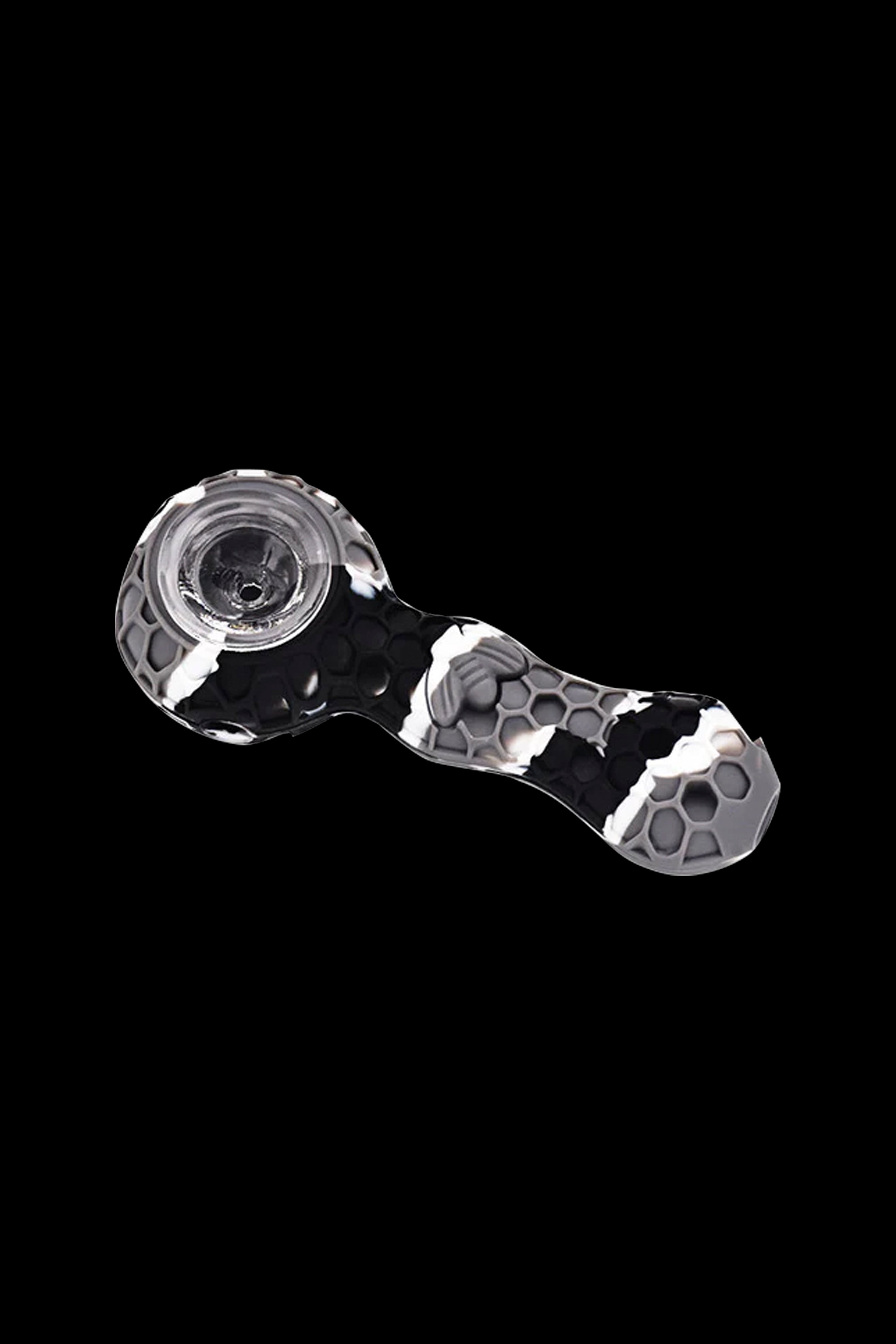 Black and white silicone cannabis pipe with skull pattern.