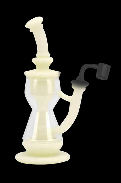 Cream-colored glass dab rig with a unique sculptural form and accompanying nail.