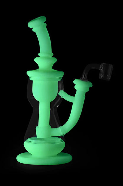 Frosted green glass dab rig with a quartz banger.
