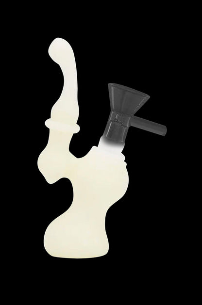 White glass water pipe shaped like a face, studio shot on black background.