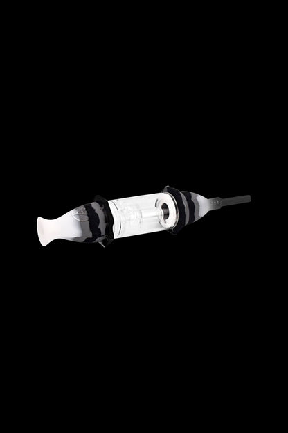 Glass cannabis oil syringe with black accents on a black background.
