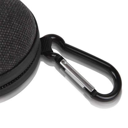 Close-up of a black carabiner clipped to the textured edge of the RYOT Hardcase against a white background