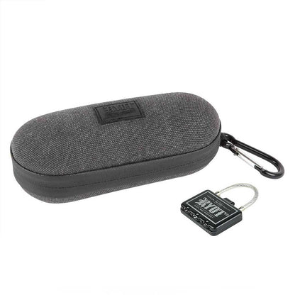 Angled view of a gray fabric RYOT Hardcase with a zipper and carabiner clip, shown alongside a small black combination cable lock.