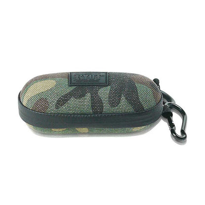 Low-angle front view of a camo RYOT Hardcase with textured fabric shell and attached black carabiner on a white background.