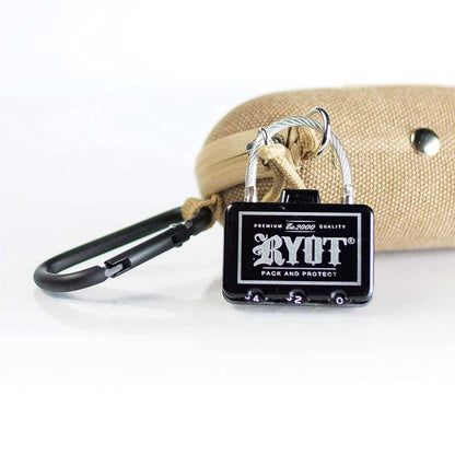 Close-up front view of a small black RYOT Hardcase lock attached to a tan fabric case with a black carabiner.