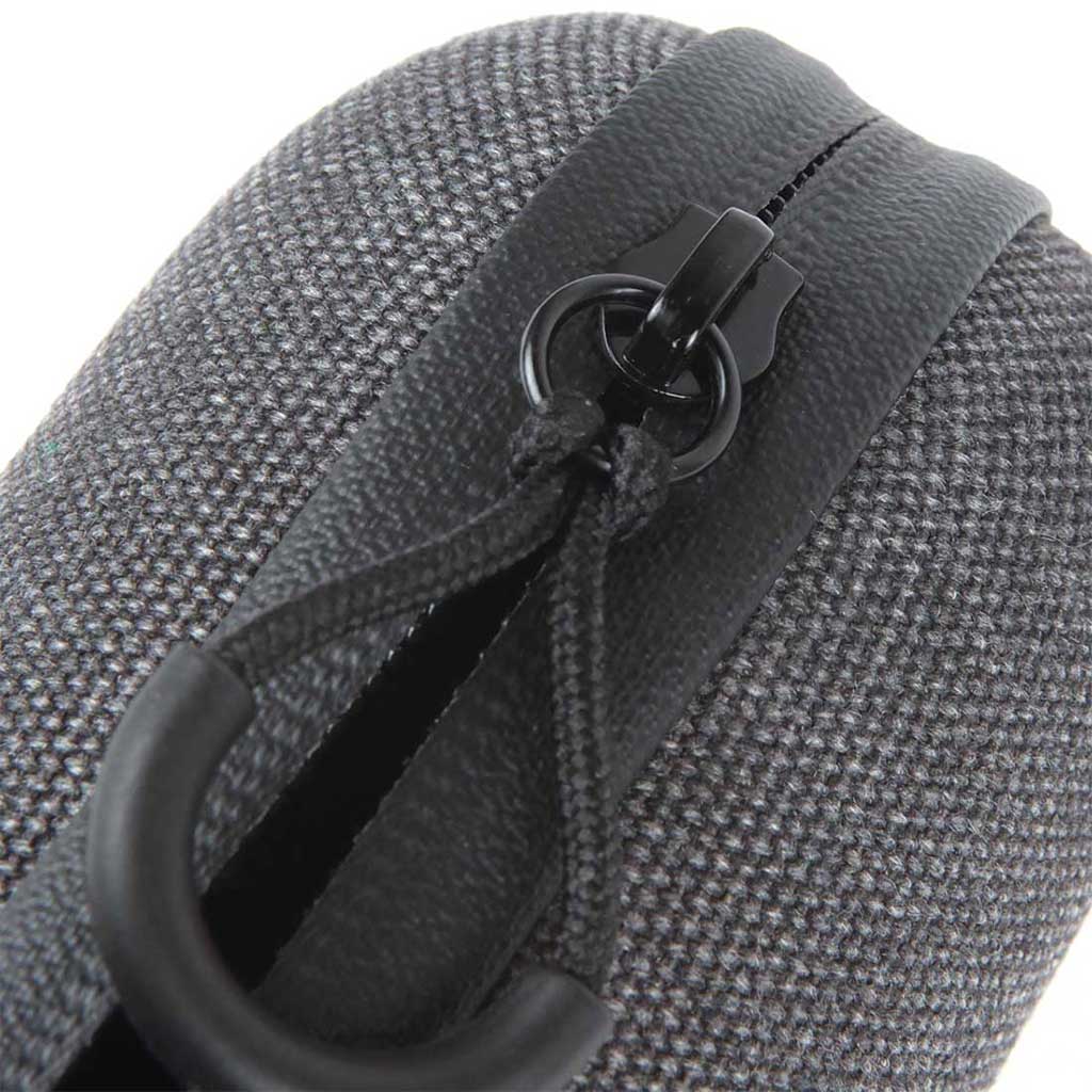 Close-up angled view of the textured gray fabric and black zipper pull on the RYOT Hardcase.
